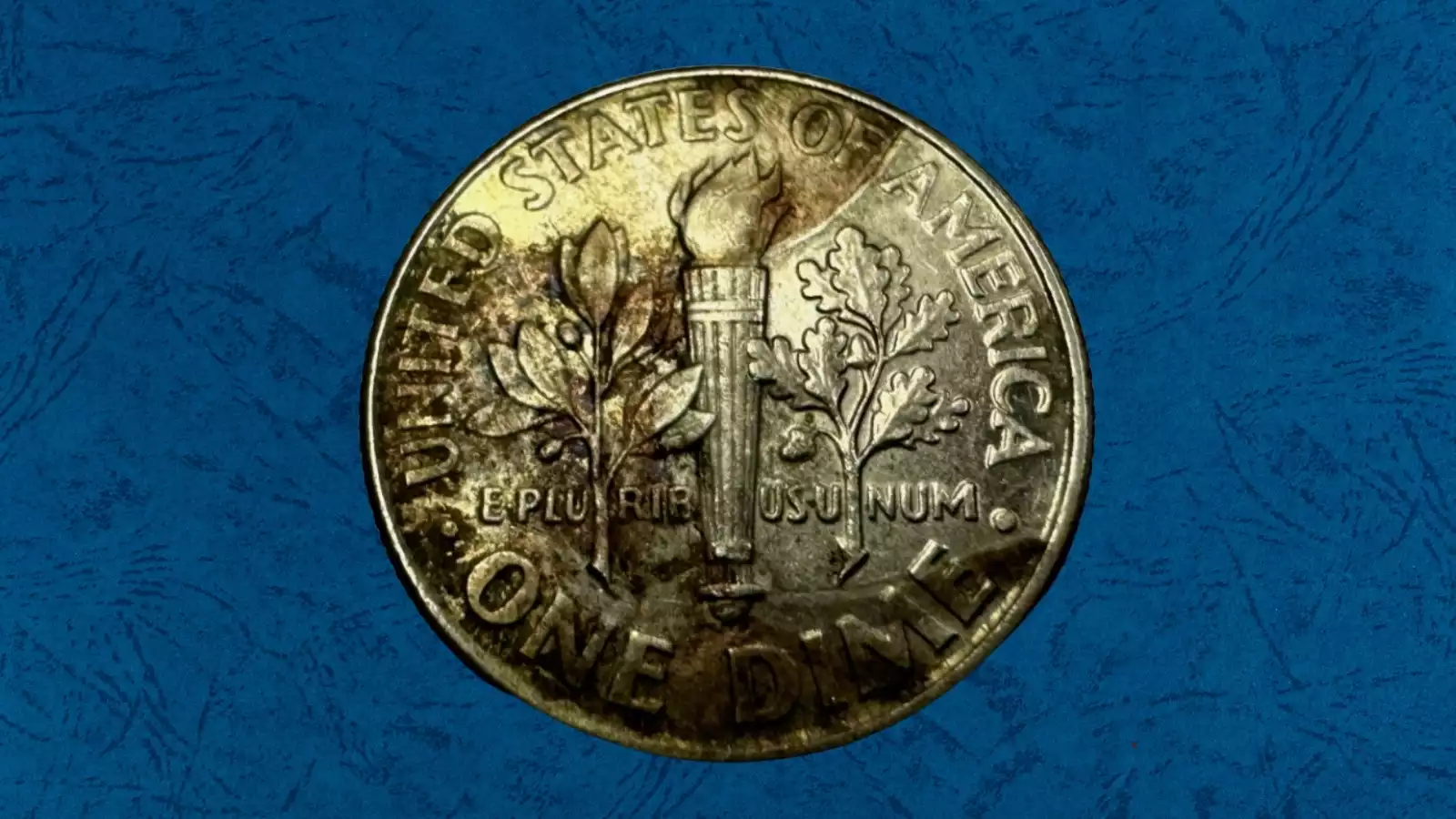 2014 Roosevelt dime misaligned die error showing off-center design with blank crescent